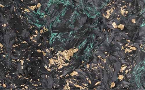 Dark carbon fiber sheet with golden texture