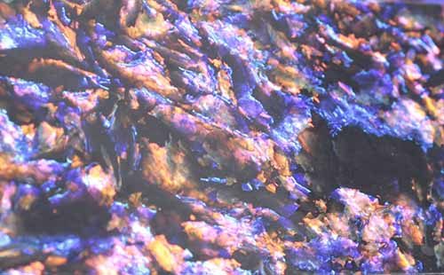 Close-up of forged carbon fiber random texture
